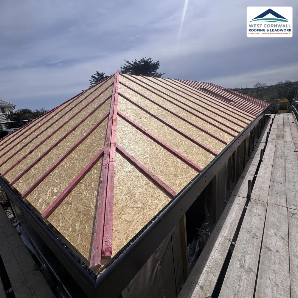 Re-roof, stripped to boards and battens
